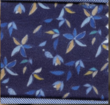 Navy blue fabric with small floral pattern