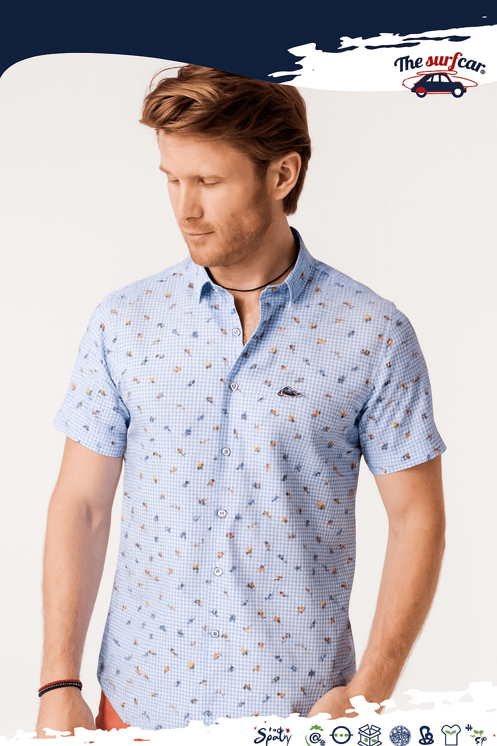 Man wearing a light blue patterned shirt on a white background